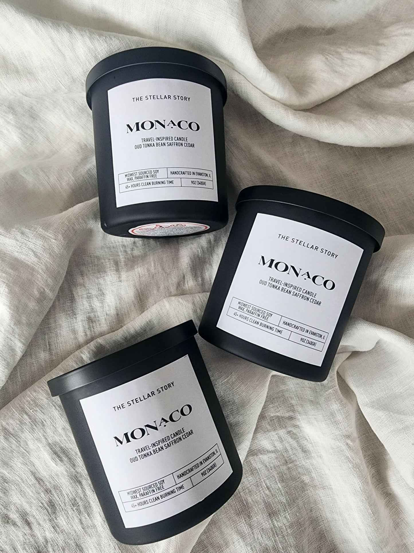 Monaco, travel-inspired candle. Clean burning candle in a black matt glass straight jar. Luxurious and sophisticated scent. Small batch, handmade, woman-owned, local.Monaco, travel-inspired candle. Clean burning candle in a black matt glass straight jar. Luxurious and sophisticated scent. Small batch, handmade, woman-owned, local.