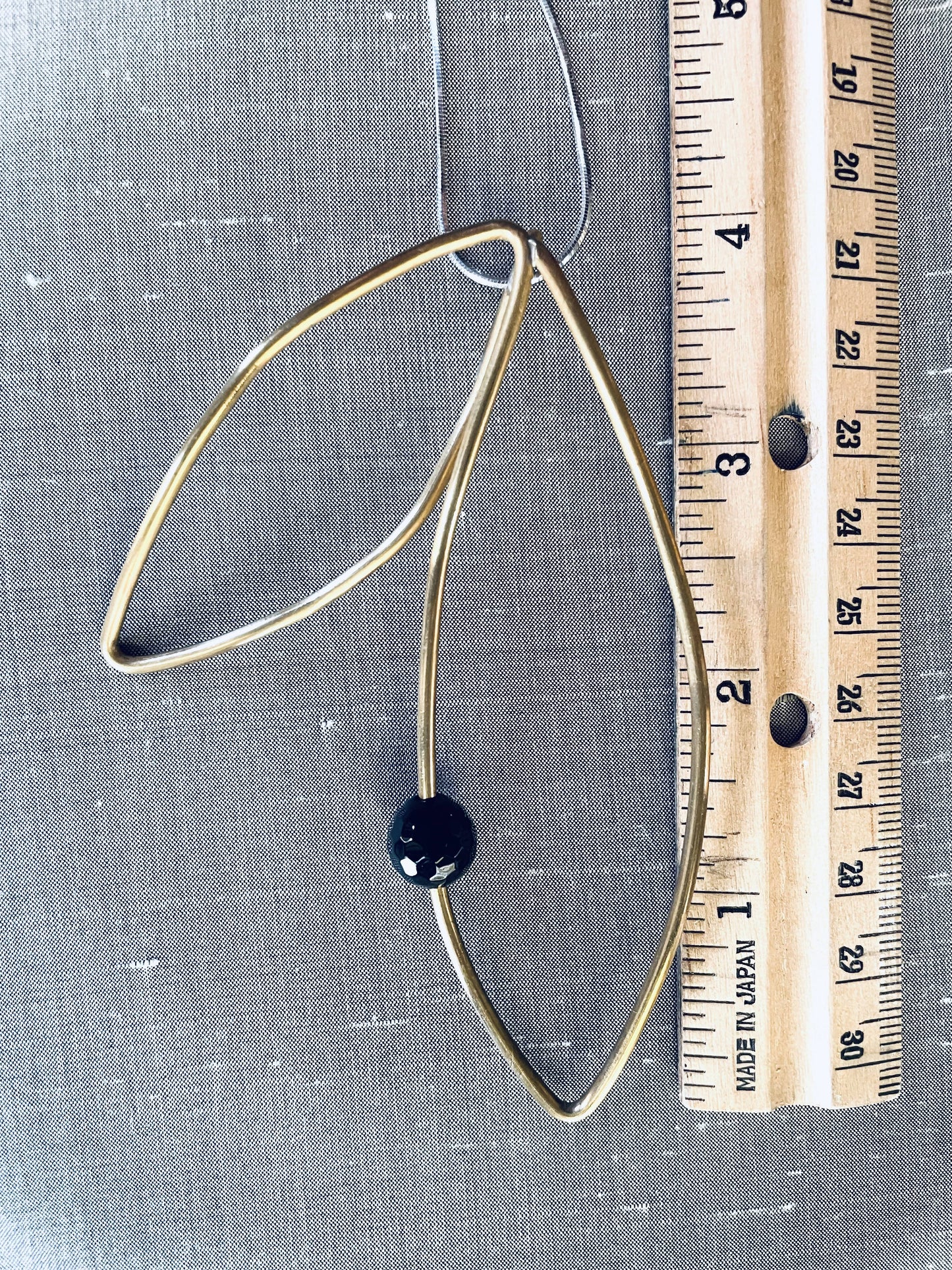 2 leaf brass pendant with onyx