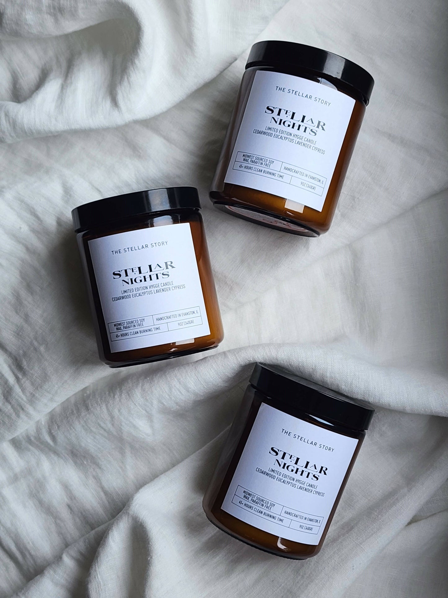 Limited Edition Hygge Candle. Clean burning candle in a dark brown tinted glass straight jar. Smells like a cozy night on the couch in front of the fire place.. Small batch, handmade, woman-owned, local.