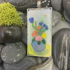 Glass vase pendant with pretty flowers