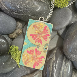 Creamy flowers in a vase on a pink and purple background. Pendant