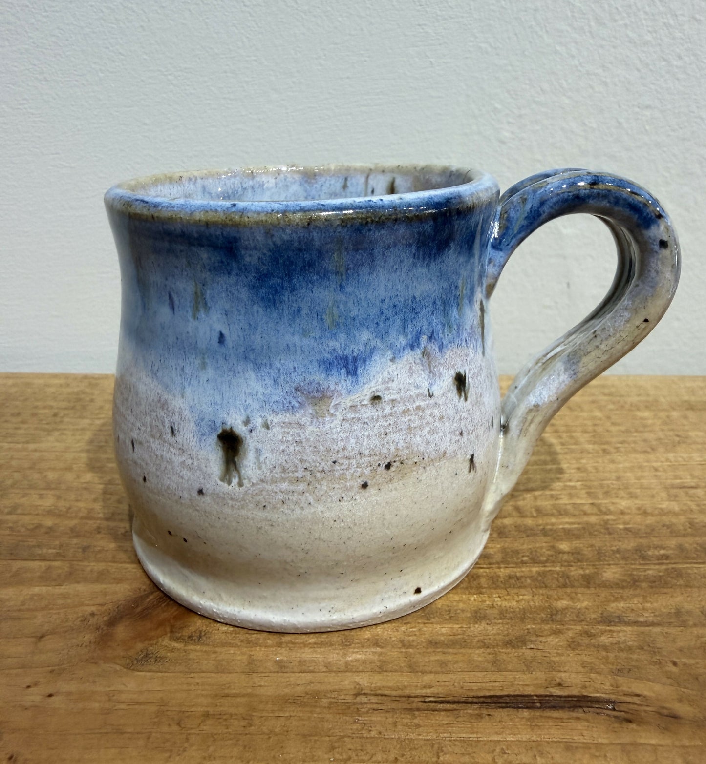 Blue speckled coffee mug