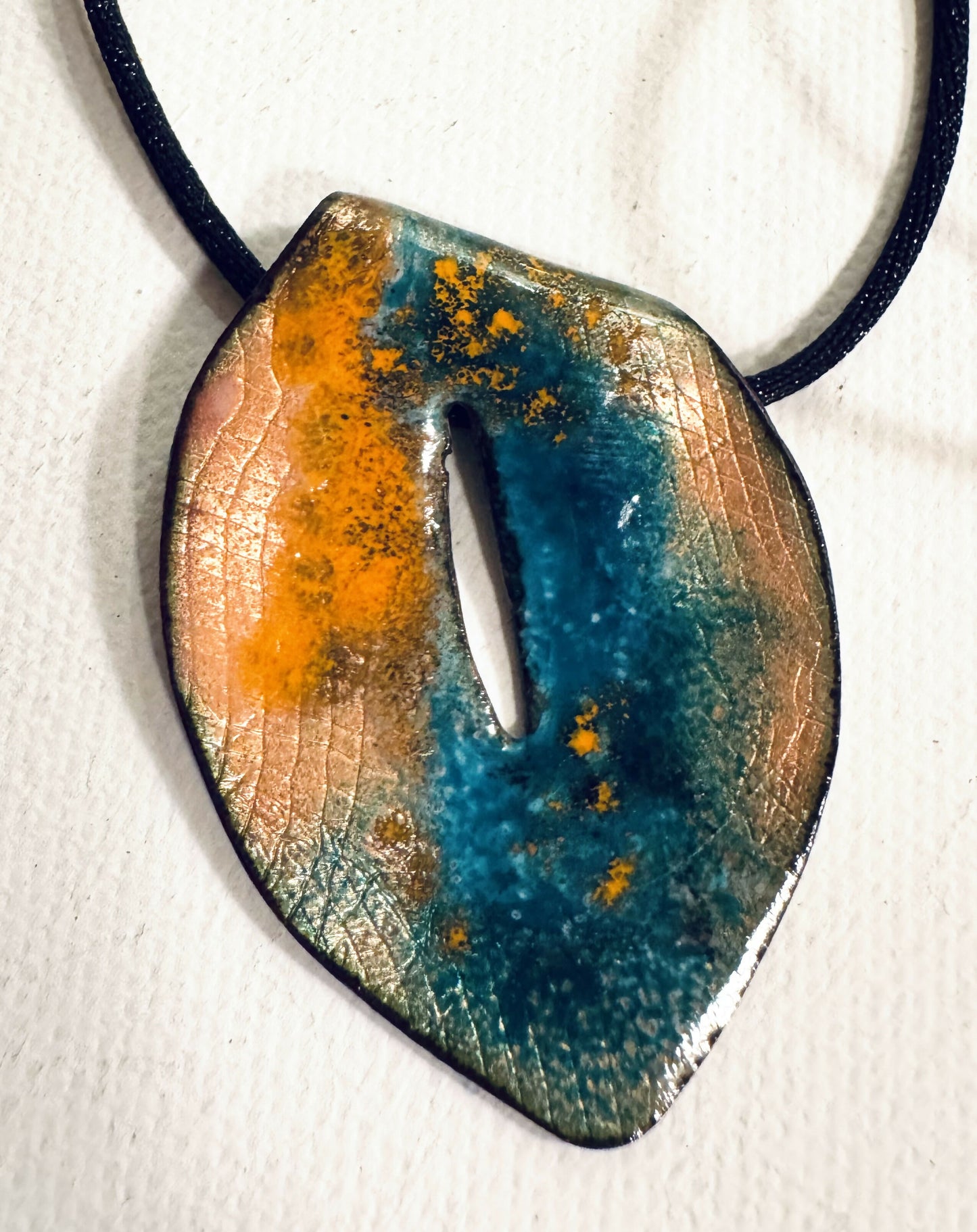 Enamel pendants