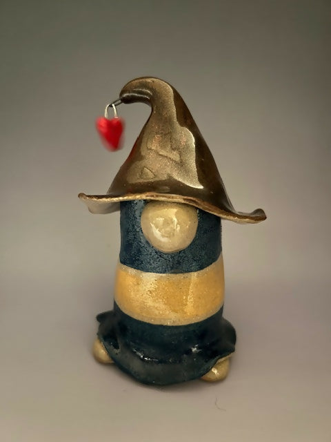 blue gnome with yellow stripe