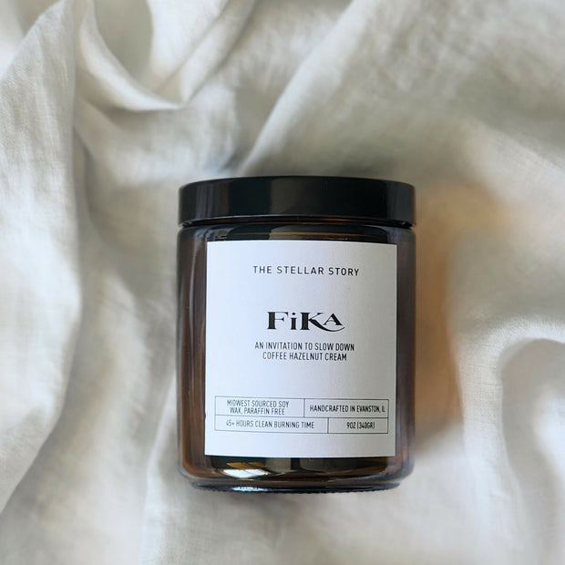 Clean burning candle in a dark brown tinted glass straight jar. Smells like coffee and good time. Small batch, handmade, woman-owned, local.