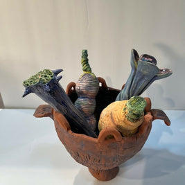 Red pot with objects