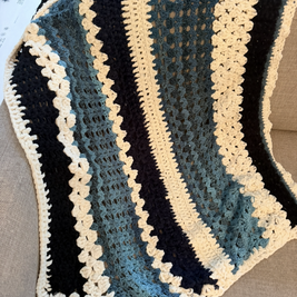 Blue and black criochet throw