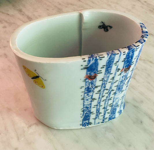 Oval vase-birch trees