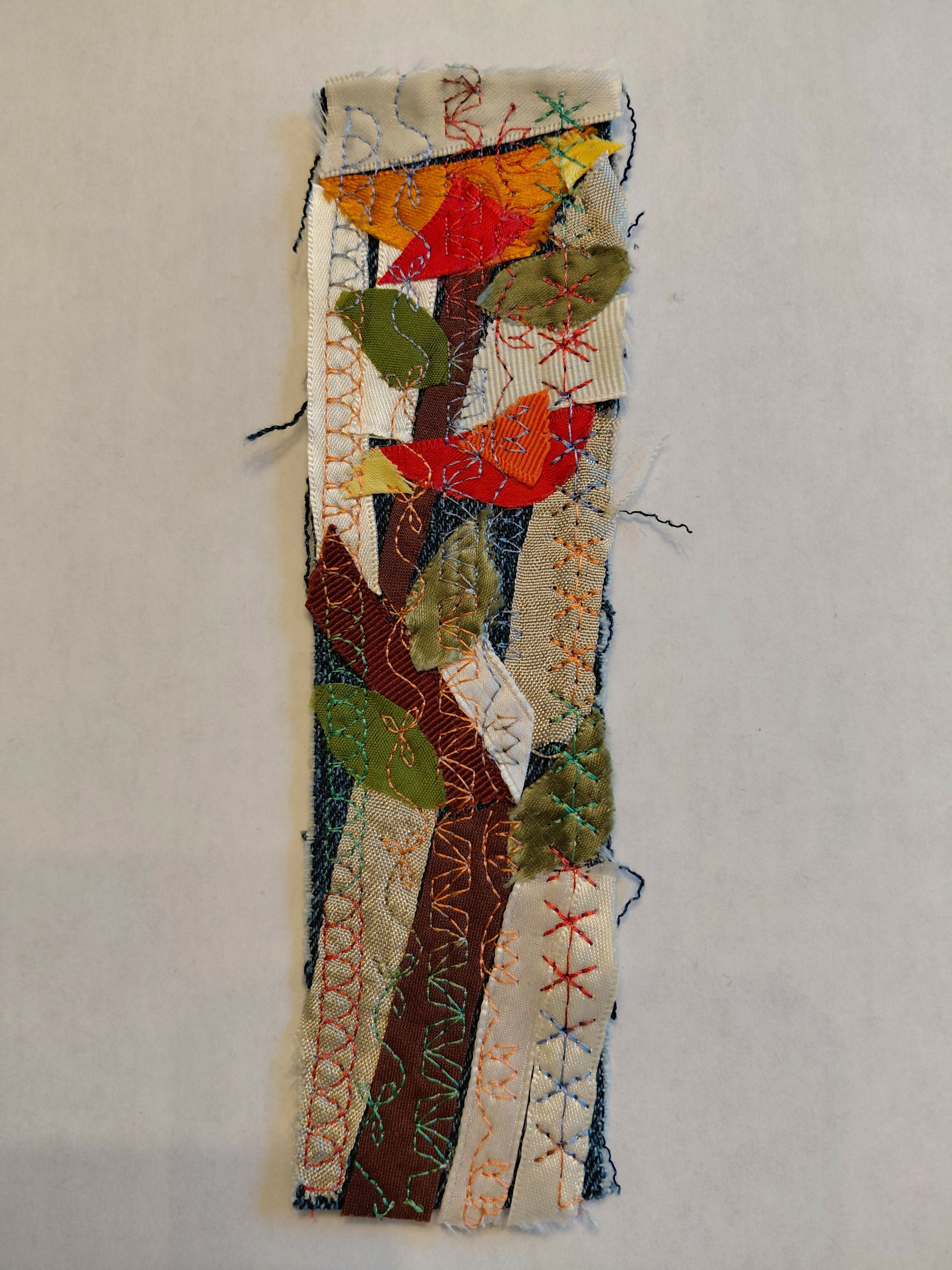 Large bird sitting on top bookmark
