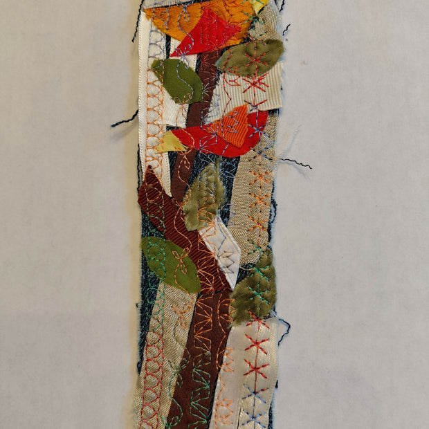 Large bird sitting on top bookmark