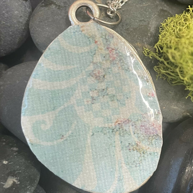 Everyone's favorite tropical bird pendant