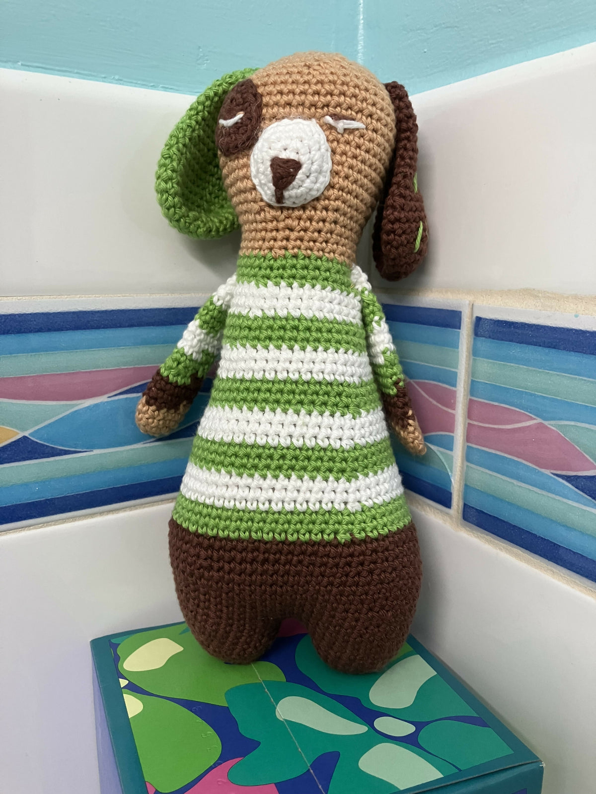 Dog with green stripe t’shirt