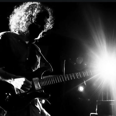 Guitar Player in black and white
