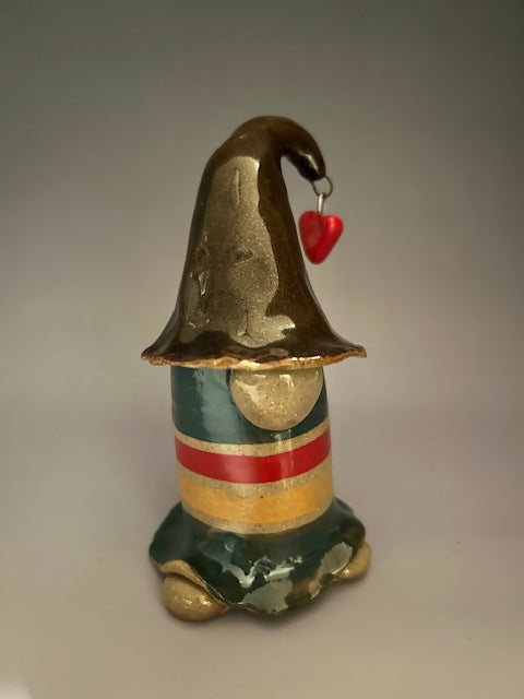 green gnome with red & yellow stripes