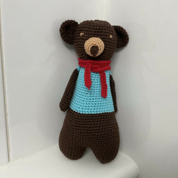 Chocolate bear with a red scarf