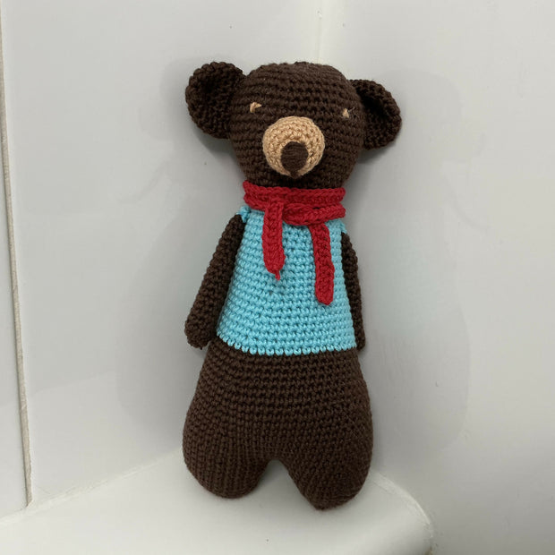 Chocolate bear with a red scarf