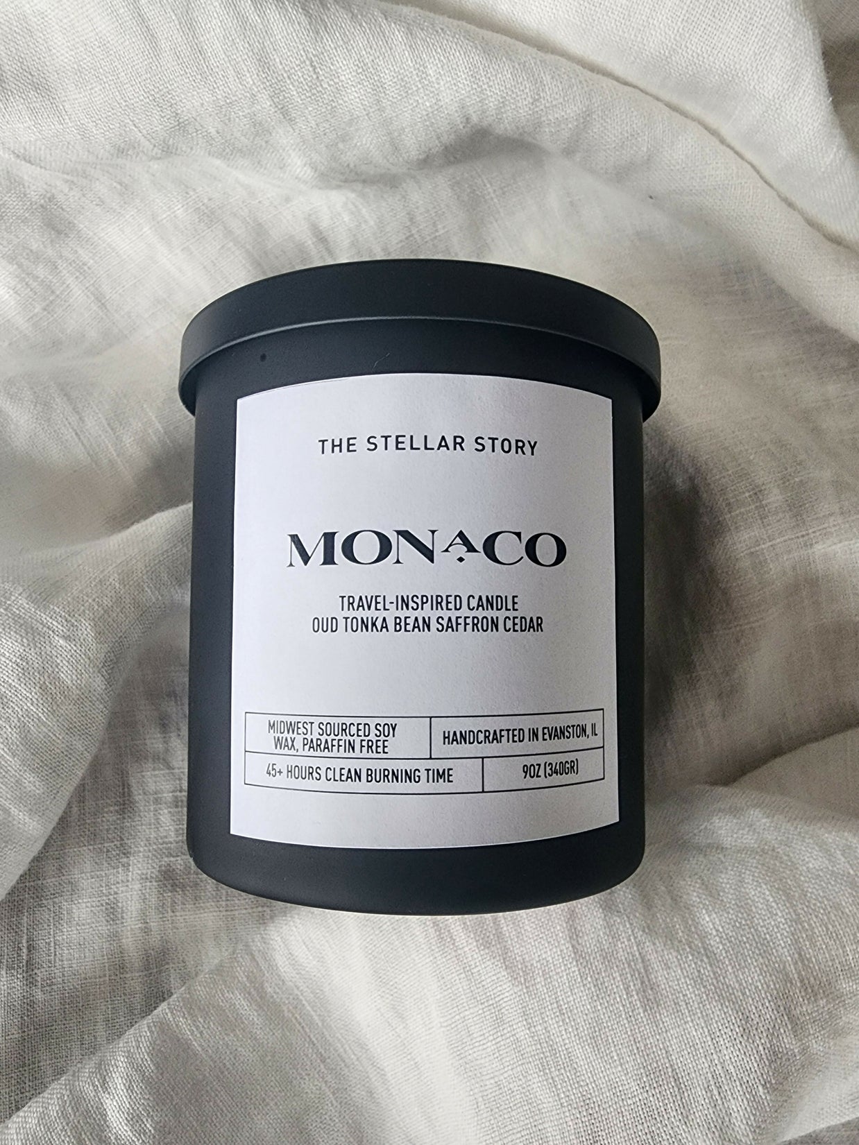 Monaco, travel-inspired candle. Clean burning candle in a black matt glass straight jar. Luxurious and sophisticated scent. Small batch, handmade, woman-owned, local.
