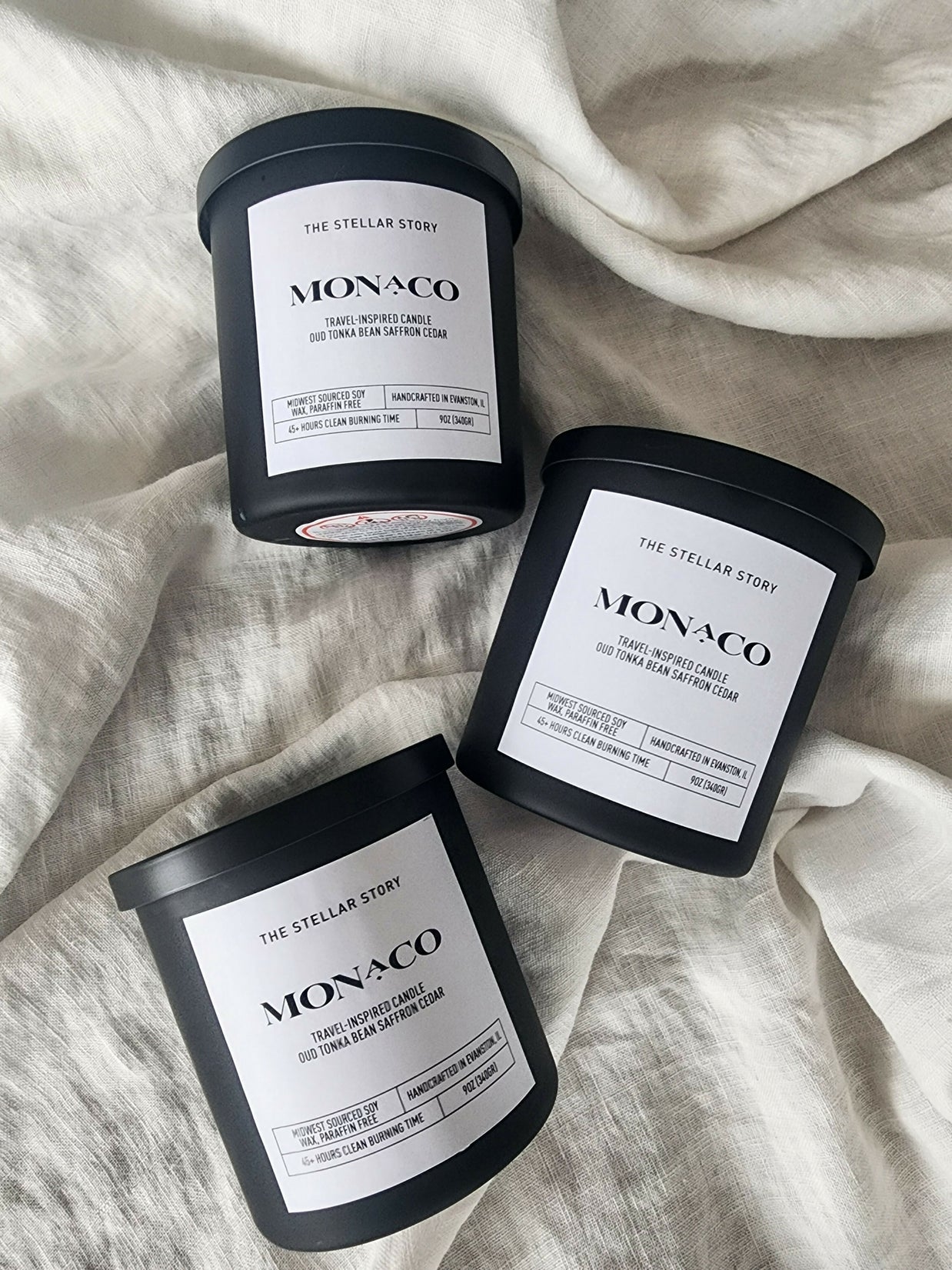 Monaco, travel-inspired candle. Clean burning candle in a black matt glass straight jar. Luxurious and sophisticated scent. Small batch, handmade, woman-owned, local.Monaco, travel-inspired candle. Clean burning candle in a black matt glass straight jar. Luxurious and sophisticated scent. Small batch, handmade, woman-owned, local.