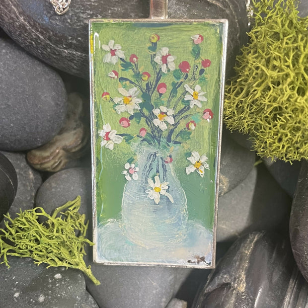 Clear vase of summer flowers pendant