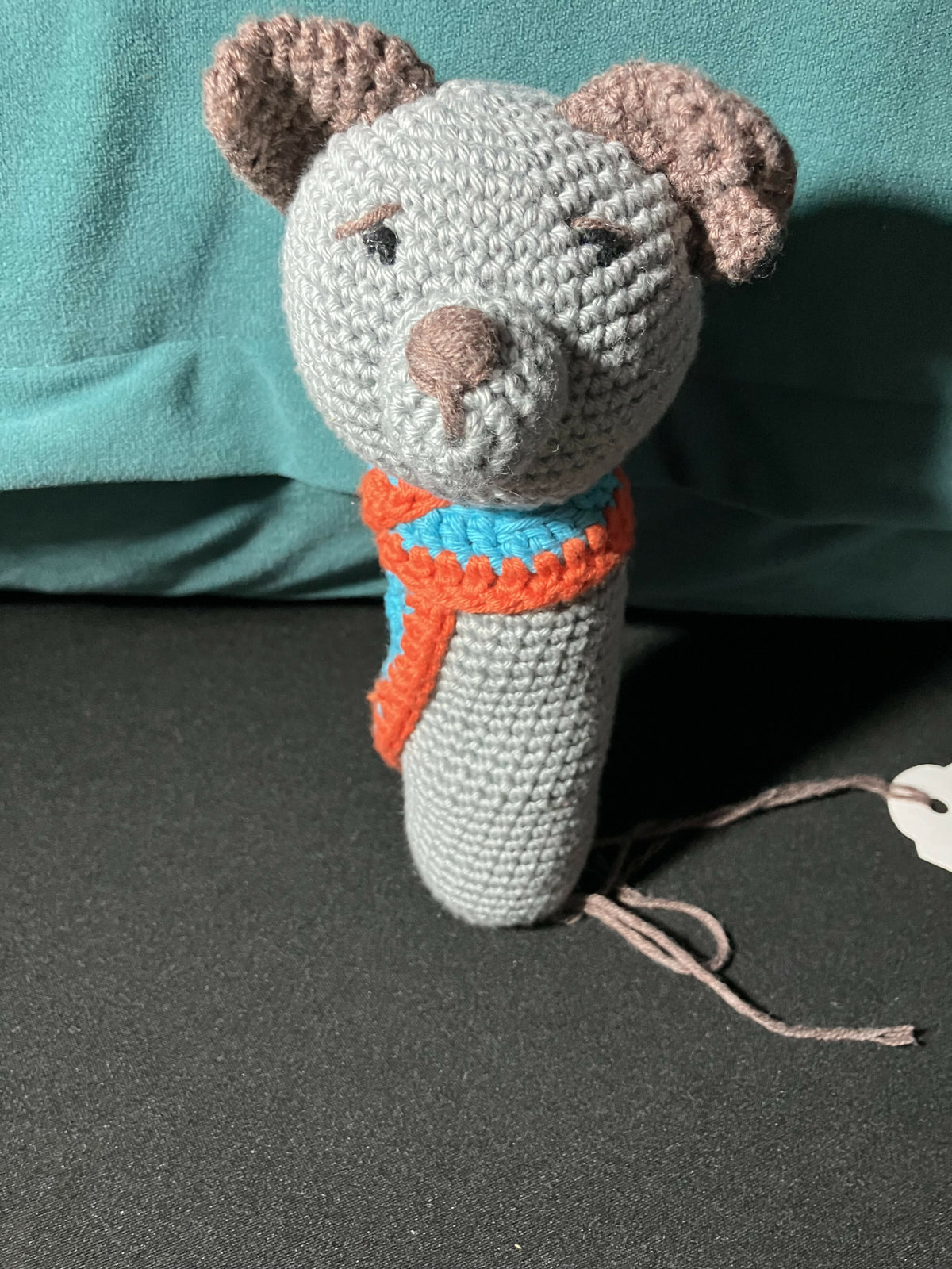 Dog with scarf rattle