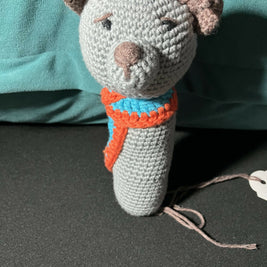 Dog with scarf rattle