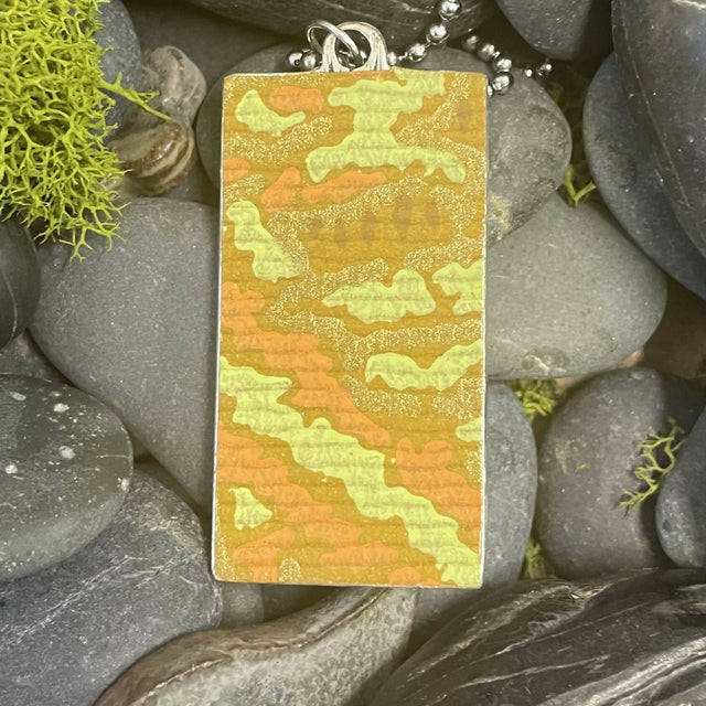 Modern art flower in a landscape pendant
