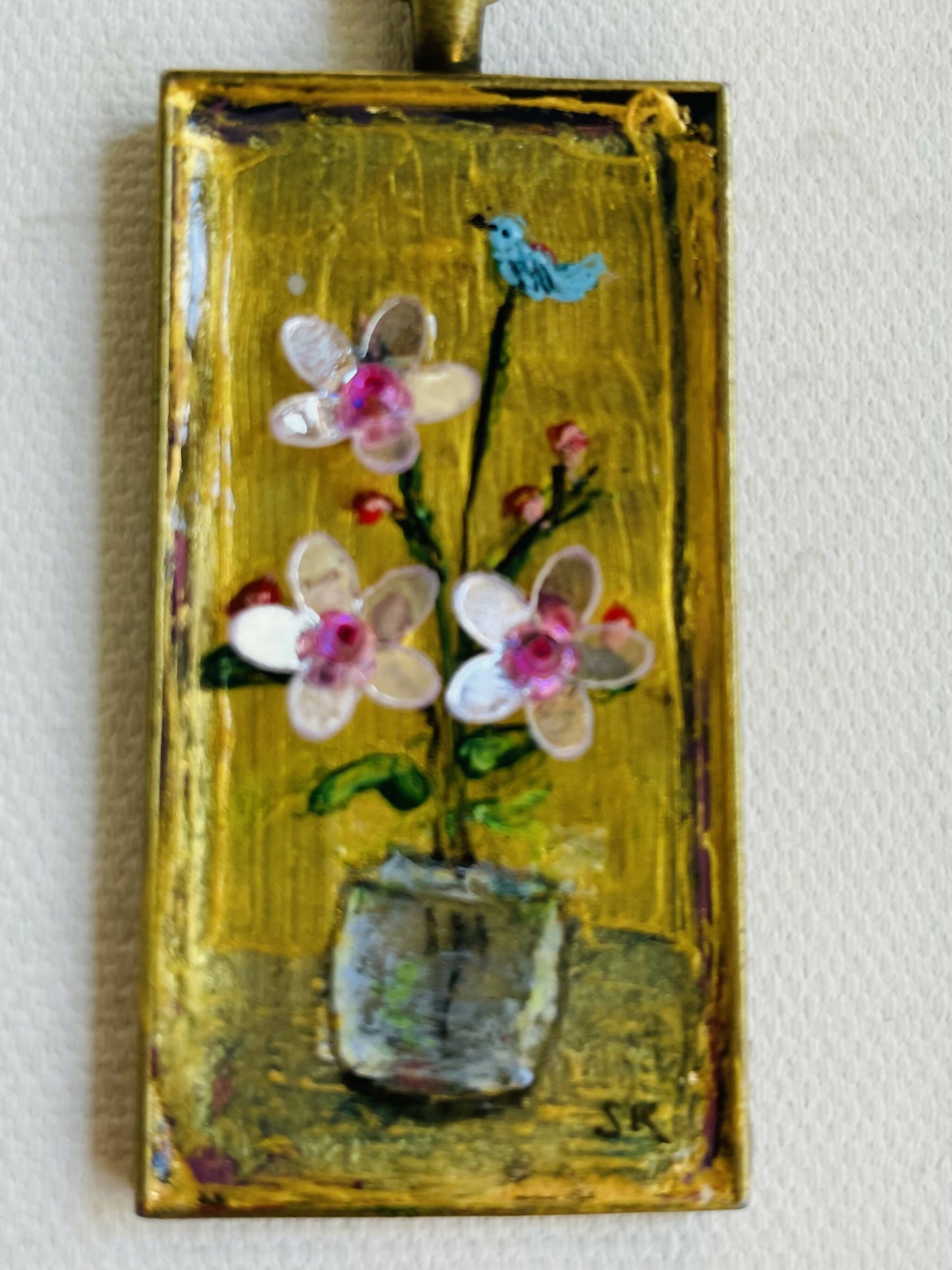 Tiny still life painting and vintage wallpaper backing