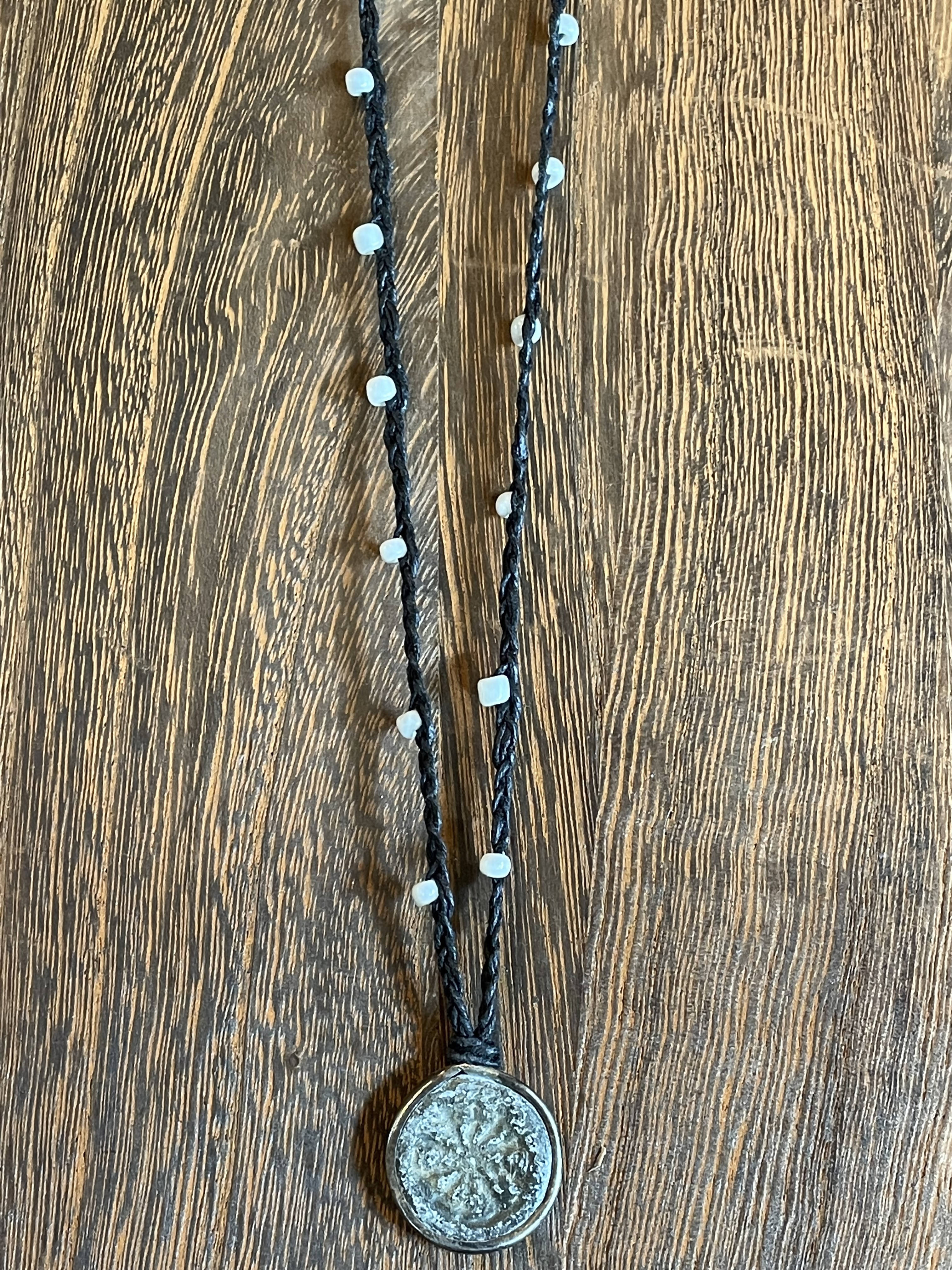 Buddhist Amulet - Dharma Wheel on assorted linen with assorted beads AMNK