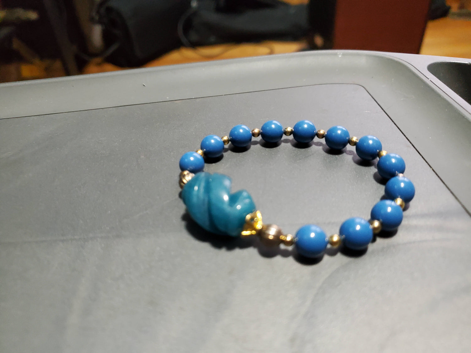 bluecrystalpearl and carved bead