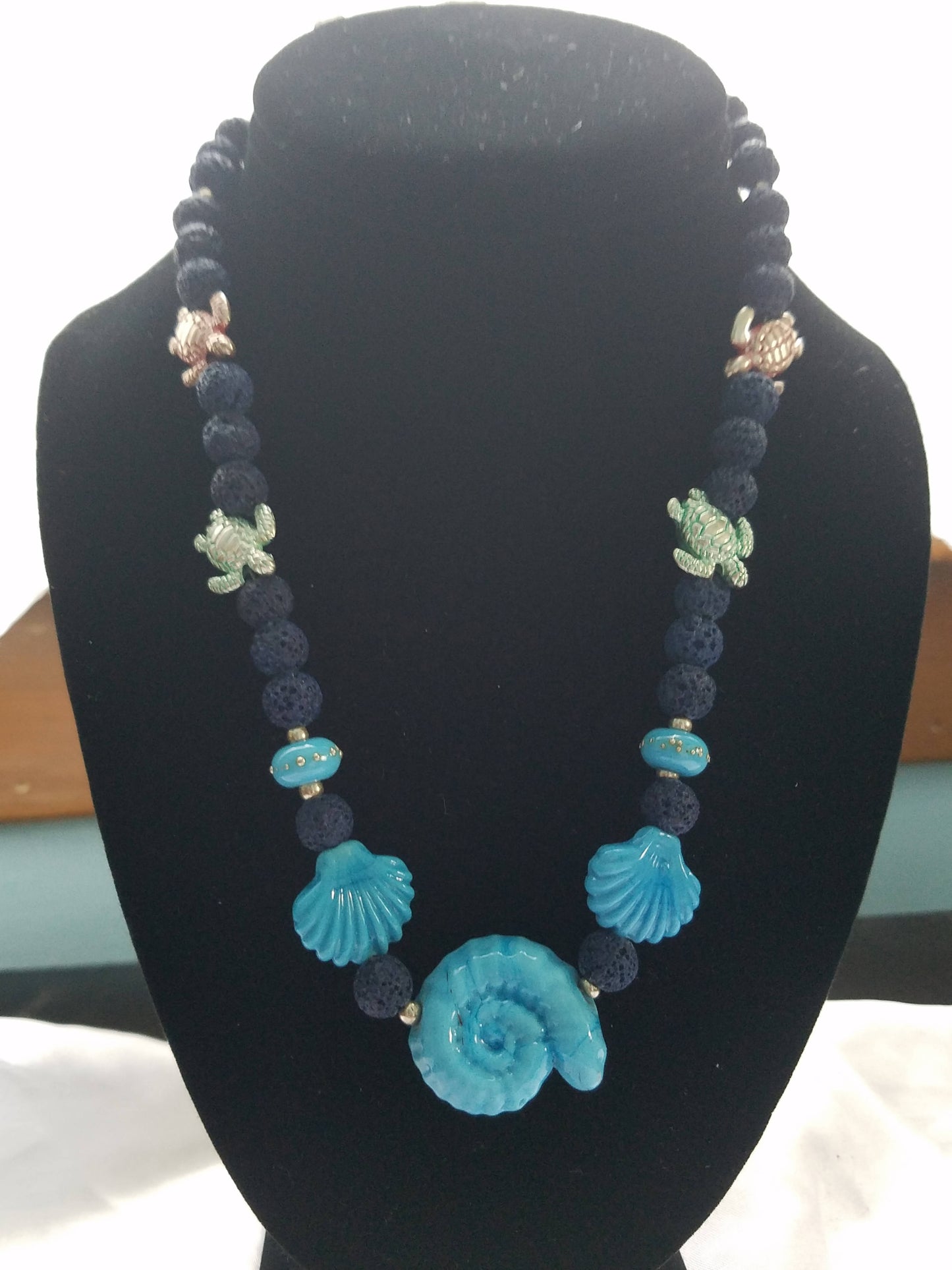 lampwork shell necklace in blues