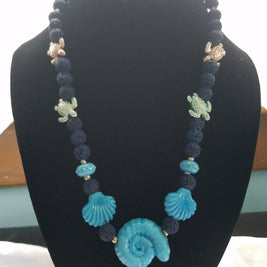 lampwork shell necklace in blues