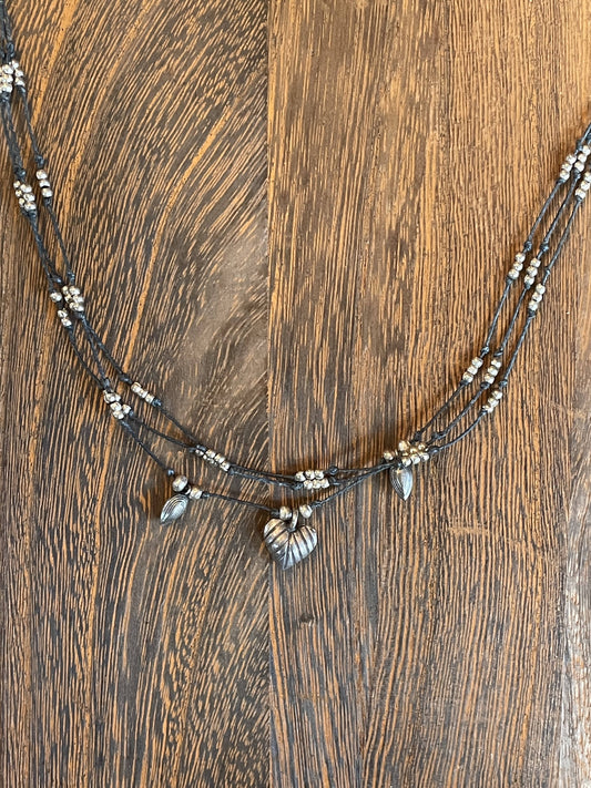 Triple strand linen necklace with fine silver beads and charms