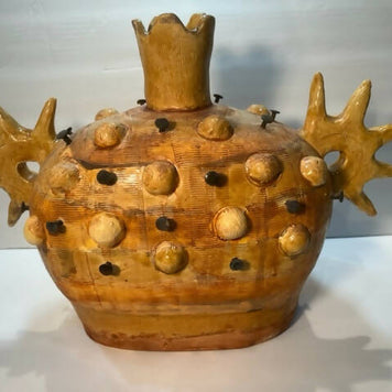 Pot with bumps