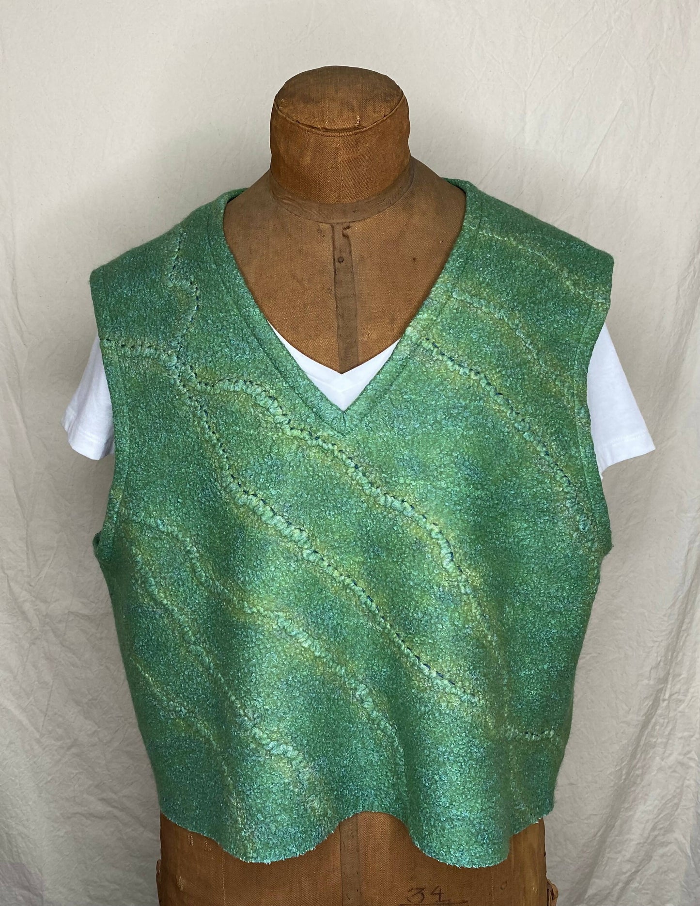 Textured green felted wool/silk crop vest
