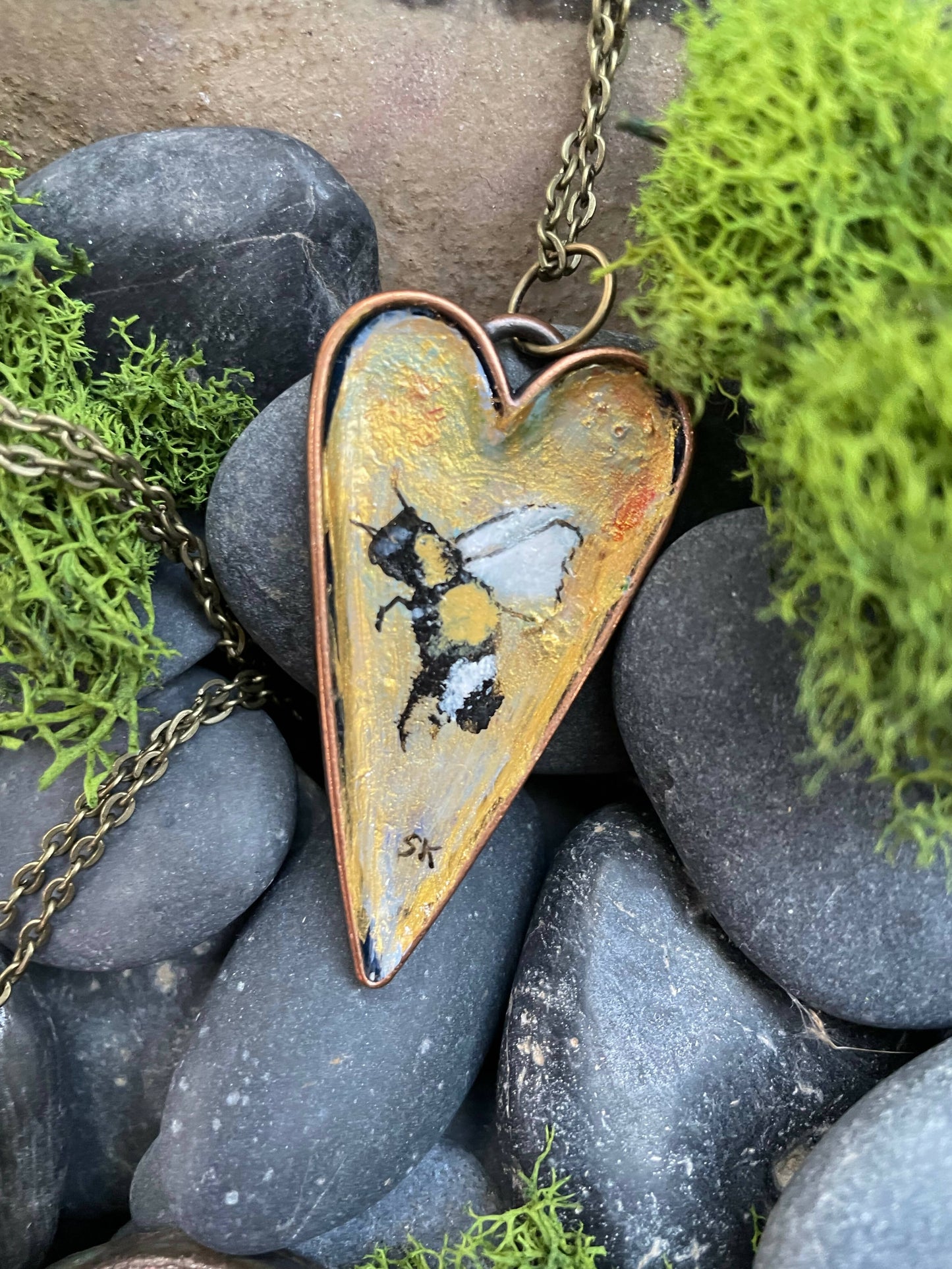 Bee in heart pendant