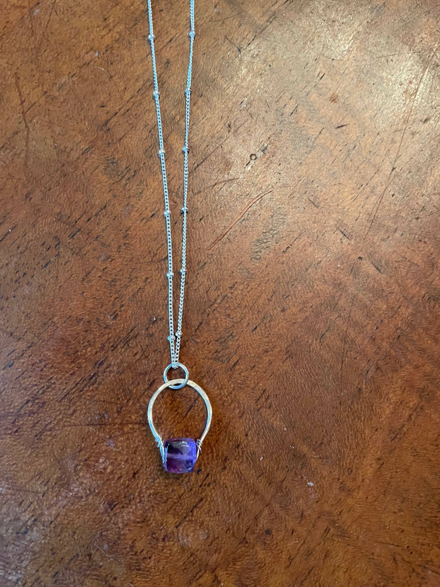 "Get lucky" Hand forged sterling silver pendant with gemstone on sterling silver chain. Assorted gemstones.