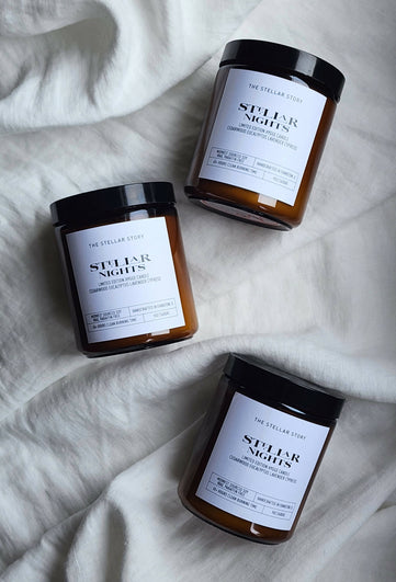 Limited Edition Hygge Candle. Clean burning candle in a dark brown tinted glass straight jar. Smells like a cozy night on the couch in front of the fire place.. Small batch, handmade, woman-owned, local.