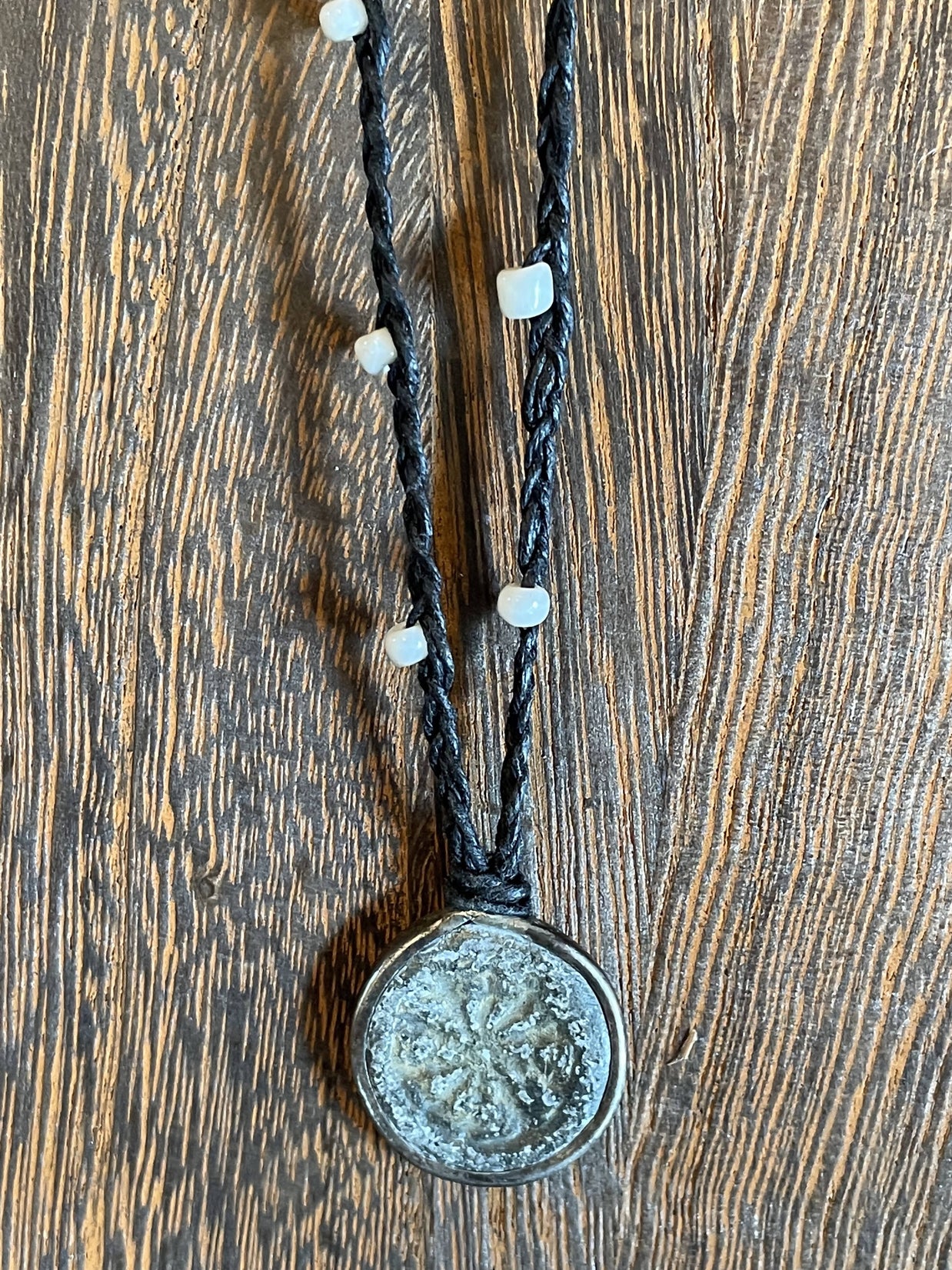 Buddhist Amulet - Dharma Wheel on assorted linen with assorted beads AMNK