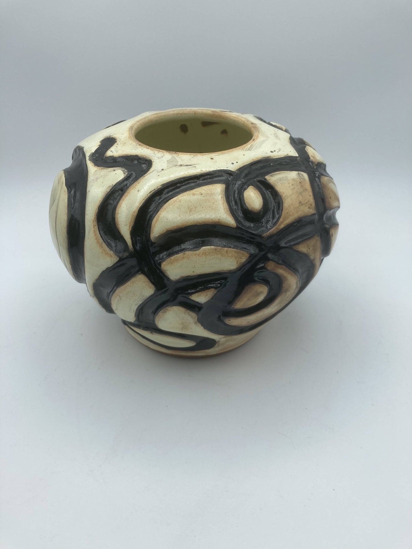 Concave shaped wheel thrown vase
